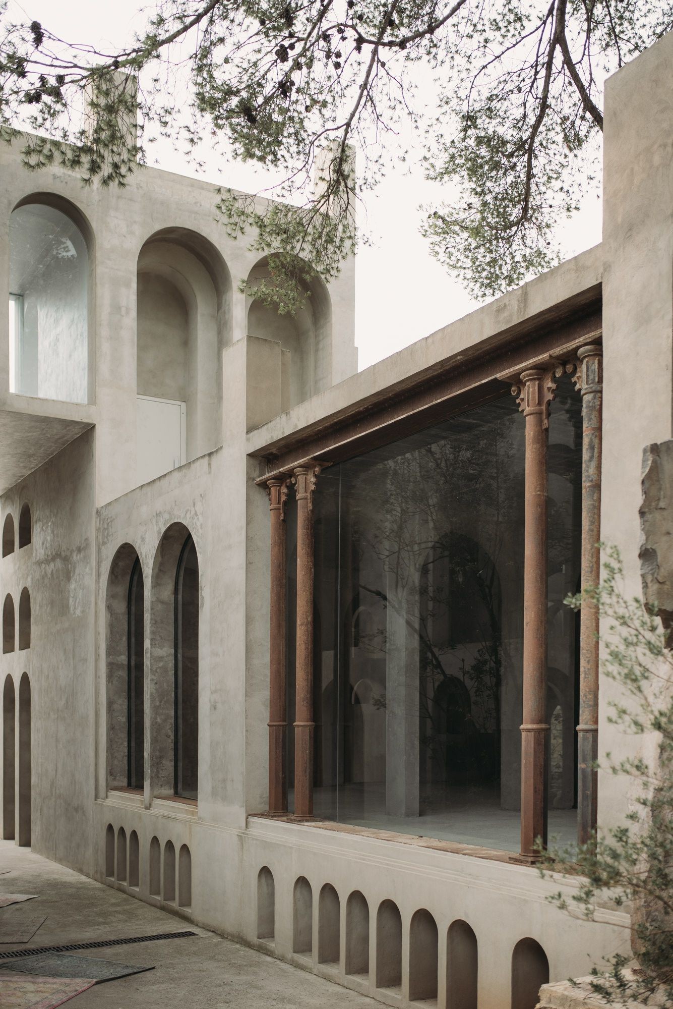 abstract sculpture with flower in vase