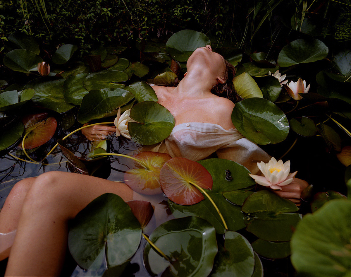 painting of two people on a beach