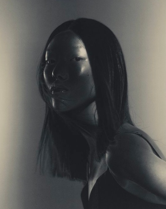 watercolor painting of building near sea