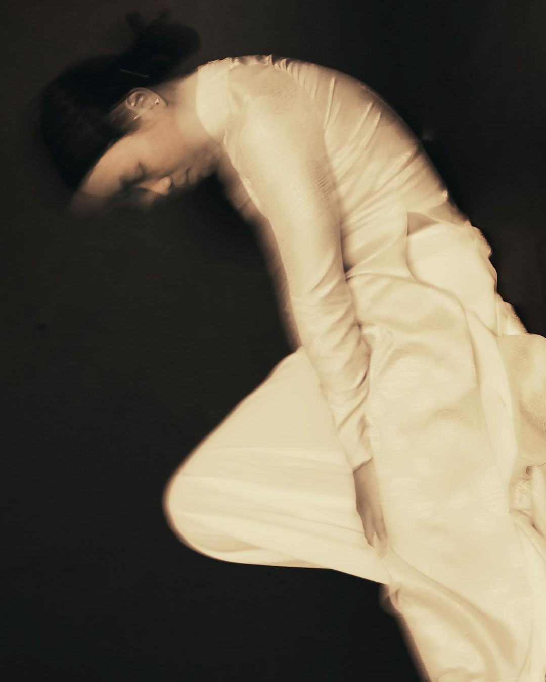 watercolor painting of building near sea