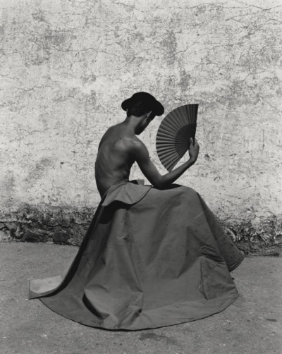 abstract sculpture with flower in vase