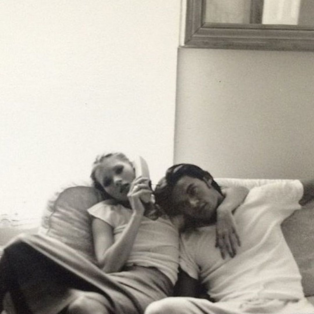 watercolor painting of building near sea