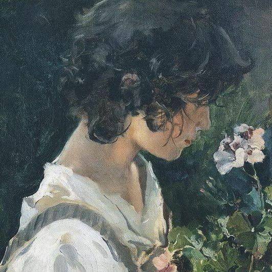 photograph of man holding balloons